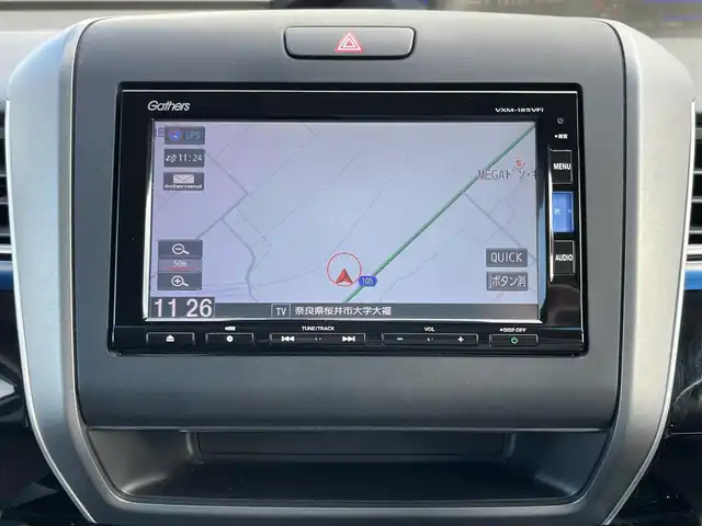 ホンダ フリード ハイブリット モデューロX ホンダセンシング 奈良県 2018(平30)年 5.4万km ホワイトオーキッドパール 純正ナビ（VXM-185VFi)/（TV/BT/CD/DVD）/純正フリップダウンモニター/レーダークルーズコントロール/バックカメラ/衝突軽減システム/レーンキープアシスト/両側パワースライドドア/ハーフレザーシート/後席サンシェード/前方ドライブレコーダー/ETC/純正15インチAW