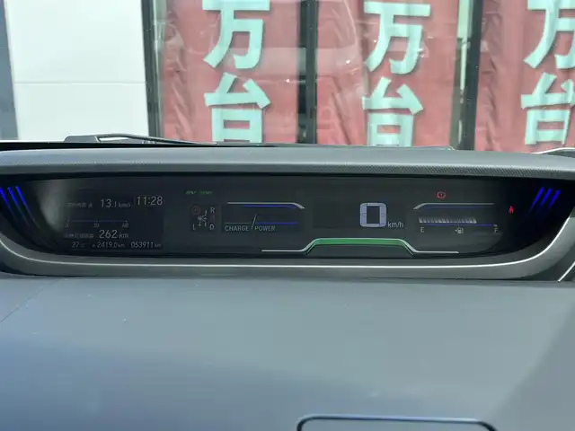 ホンダ フリード ハイブリット モデューロX ホンダセンシング 奈良県 2018(平30)年 5.4万km ホワイトオーキッドパール 純正ナビ（VXM-185VFi)/（TV/BT/CD/DVD）/純正フリップダウンモニター/レーダークルーズコントロール/バックカメラ/衝突軽減システム/レーンキープアシスト/両側パワースライドドア/ハーフレザーシート/後席サンシェード/前方ドライブレコーダー/ETC/純正15インチAW