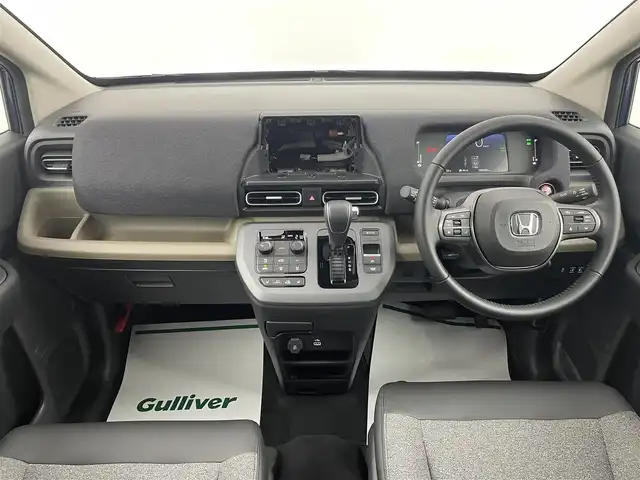 ホンダ フリード ハイブリット e:HEV AIR EX 埼玉県 2025(令7)年 0.1千km 青 登録済未使用車 両側パワースライドドア ブラインドスポットモニター シートヒーター ハーフレザーシート レーダークルーズコントロール コーナーセンサー 衝突軽減システム 純正LEDヘッドライト