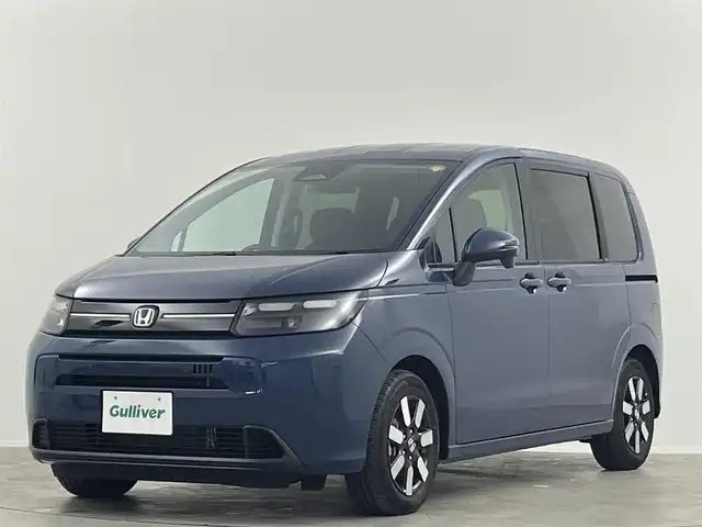 ホンダ フリード ハイブリット e:HEV AIR EX 埼玉県 2025(令7)年 0.1千km 青 登録済未使用車 両側パワースライドドア ブラインドスポットモニター シートヒーター ハーフレザーシート レーダークルーズコントロール コーナーセンサー 衝突軽減システム 純正LEDヘッドライト