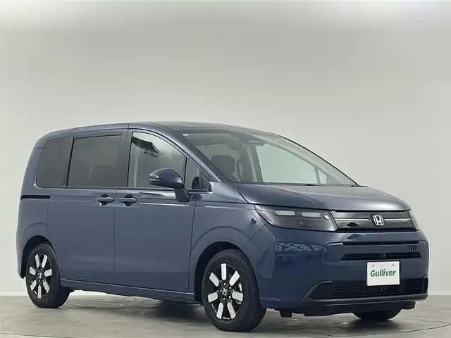 ホンダ フリード ハイブリット e:HEV AIR EX 埼玉県 2025(令7)年 0.1千km 青 登録済未使用車 両側パワースライドドア ブラインドスポットモニター シートヒーター ハーフレザーシート レーダークルーズコントロール コーナーセンサー 衝突軽減システム 純正LEDヘッドライト