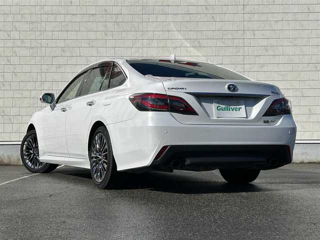 トヨタ クラウン ハイブリッド G－エグゼクティブ Four 福井県 2021(令3)年 8万km プレシャスホワイトパール 4WD/純正12.3型ナビ/フルセグTV/パノラミックビューモニター/ビルトインETC2.0/純正ドライブレコーダー/レーダークルーズコントロール/クリアランスソナー/セーフティセンス/・衝突被害軽減ブレーキ/・車線逸脱防止支援/・アダプティブハイビーム/・標識認識/・先行車発進告知機能/・ドライバー異常時対応システム/ブラインドスポットモニター/パーキングサポートブレーキ/デジタルインナーミラー/3眼LEDヘッドランプ/デュアルオートエアコン/革巻きステアリング/ステアリングヒーター/純正OPグレー革シート/全席パワーシート/シートヒーター/前席シートベンチレーション/運転席ポジションメモリー/純正18インチアルミホイール/スマートキー/プッシュエンジンスタート/禁煙車