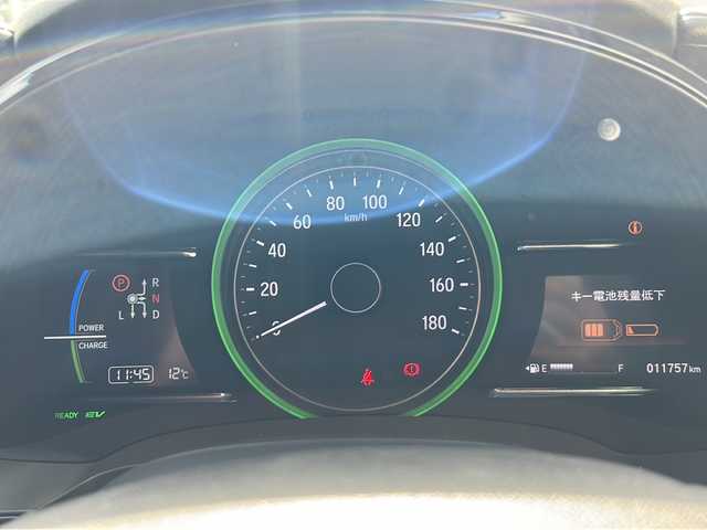 ホンダ シャトル ハイブリッド ホンダセンシング 石川県 2020(令2)年 1.2万km プラチナホワイトパール SDナビ/バックカメラ/ETC/スマートキー/LEDヘッドライト/レーンキープアシスト/横滑り防止装置/衝突被害軽減システム/W＋サイド＋カーテンエアバック/純正フロアマット/純正アルミホイール