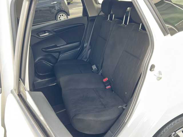 ホンダ シャトル ハイブリッド ホンダセンシング 石川県 2020(令2)年 1.2万km プラチナホワイトパール SDナビ/バックカメラ/ETC/スマートキー/LEDヘッドライト/レーンキープアシスト/横滑り防止装置/衝突被害軽減システム/W＋サイド＋カーテンエアバック/純正フロアマット/純正アルミホイール