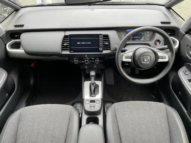 ホンダ フィット e:HEVホーム 東京都 2024(令6)年 0.2万km ミッドナイトブルービームM 純正９型ＳＤナビ＆フルセグ　/ホンダセンシング　/・パーキングセンサーシステム　/・アダプティブクルーズコントロール　/・衝突軽減ブレーキ　/・路外逸脱警報システム　/・歩行者事故低ステアリング/・標識認識機能/・先行車発進お知らせ機能/・路外逸脱警報/・車線維持支援システム/・トラフィックジャムアシスト/・オートハイビーム/ＬＥＤヘッドライト　/ビルトインETC/プッシュエンジンスタート/純正フロアマット/保証書＆取説/Wエアバック＆ABS