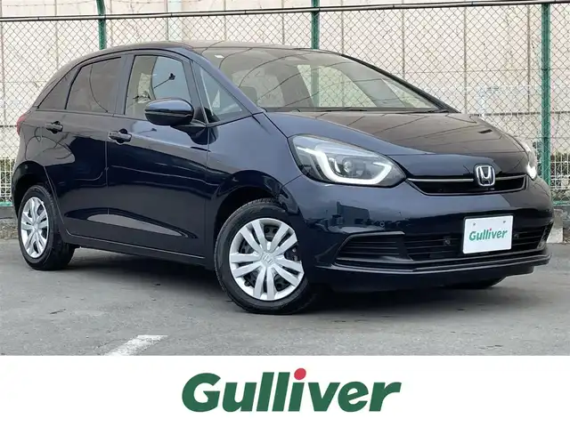 ホンダ フィット e:HEVホーム 東京都 2024(令6)年 0.2万km ミッドナイトブルービームM 純正９型ＳＤナビ＆フルセグ　/ホンダセンシング　/・パーキングセンサーシステム　/・アダプティブクルーズコントロール　/・衝突軽減ブレーキ　/・路外逸脱警報システム　/・歩行者事故低ステアリング/・標識認識機能/・先行車発進お知らせ機能/・路外逸脱警報/・車線維持支援システム/・トラフィックジャムアシスト/・オートハイビーム/ＬＥＤヘッドライト　/ビルトインETC/プッシュエンジンスタート/純正フロアマット/保証書＆取説/Wエアバック＆ABS