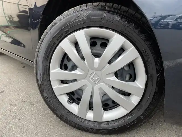 ホンダ フィット e:HEVホーム 東京都 2024(令6)年 0.2万km ミッドナイトブルービームM 純正９型ＳＤナビ＆フルセグ　/ホンダセンシング　/・パーキングセンサーシステム　/・アダプティブクルーズコントロール　/・衝突軽減ブレーキ　/・路外逸脱警報システム　/・歩行者事故低ステアリング/・標識認識機能/・先行車発進お知らせ機能/・路外逸脱警報/・車線維持支援システム/・トラフィックジャムアシスト/・オートハイビーム/ＬＥＤヘッドライト　/ビルトインETC/プッシュエンジンスタート/純正フロアマット/保証書＆取説/Wエアバック＆ABS