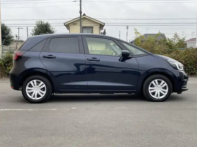 ホンダ フィット e:HEVホーム 東京都 2024(令6)年 0.2万km ミッドナイトブルービームM 純正９型ＳＤナビ＆フルセグ　/ホンダセンシング　/・パーキングセンサーシステム　/・アダプティブクルーズコントロール　/・衝突軽減ブレーキ　/・路外逸脱警報システム　/・歩行者事故低ステアリング/・標識認識機能/・先行車発進お知らせ機能/・路外逸脱警報/・車線維持支援システム/・トラフィックジャムアシスト/・オートハイビーム/ＬＥＤヘッドライト　/ビルトインETC/プッシュエンジンスタート/純正フロアマット/保証書＆取説/Wエアバック＆ABS