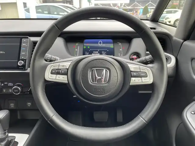 ホンダ フィット e:HEVホーム 東京都 2024(令6)年 0.2万km ミッドナイトブルービームM 純正９型ＳＤナビ＆フルセグ　/ホンダセンシング　/・パーキングセンサーシステム　/・アダプティブクルーズコントロール　/・衝突軽減ブレーキ　/・路外逸脱警報システム　/・歩行者事故低ステアリング/・標識認識機能/・先行車発進お知らせ機能/・路外逸脱警報/・車線維持支援システム/・トラフィックジャムアシスト/・オートハイビーム/ＬＥＤヘッドライト　/ビルトインETC/プッシュエンジンスタート/純正フロアマット/保証書＆取説/Wエアバック＆ABS