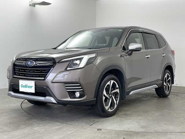 スバル フォレスター ハイブリッド アドバンス 兵庫県 2021(令3)年 4.9万km グレーＭ ・純正8インチナビ＆CD＆DVD＆BT＆SD＆HDMI＆TV/・アイサイト コアテクノロジー/・プリクラッシュブレーキ/・後退時ブレーキアシスト/・AT誤発進抑制制御/・AT誤後進抑制制御/・ツーリングアシスト/・全車速追従機能付クルーズコントロール/・定速クルーズコントロール//・車線逸脱抑制/・車線逸脱警報/・ふらつき警報/・先行車発進お知らせ機能/・ドライバーモニタリングシステム/・D+N席パワーシート/・全席シートヒーター/・D席メモリーシート/・パワーバックドア/・デジタルインナーミラー/・電動パーキングブレーキ/・ブレーキホールド/・ステアリングヒーター/・バック/フロント/サイドカメラ/・ドライブレコーダー/・パドルシフト/・ハーフレザーシート/・純正18インチAW/・純正フロアマット/・LEDヘッドライト/・ETC/・純正フロアマット/・革巻ステアリング/・プッシュスタート/・スペアキー