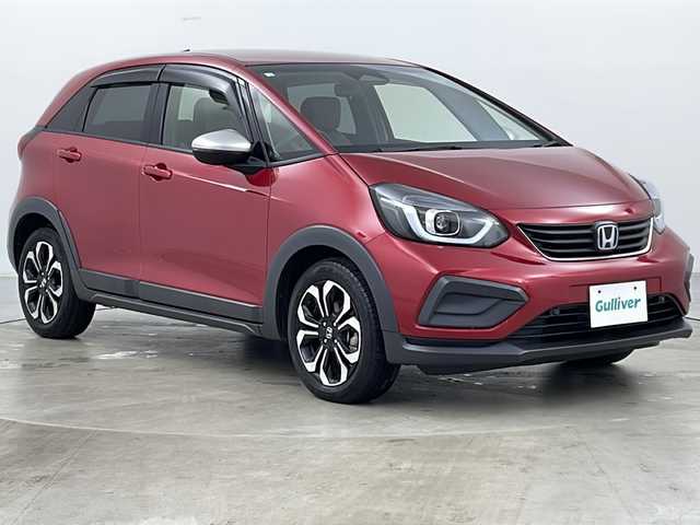 ホンダ フィット e:HEVクロスター 道央・札幌 2020(令2)年 1.4万km プレミアムクリスタルレッドM ・4WD/・純正Gathersナビ&フルセグ&CD&DVD&SD&BT&AUX&USB&ipod/・ホンダセンシング/・路外逸脱抑制機能/・踏み間違え衝突軽減システム/・衝突軽減ブレーキ/・誤発進抑制システム/・後方誤発進抑制システム/・先行車事故低減ステアリング/・先行車発進お知らせ/・渋滞追従機能型アダプティブクルーズコントロール/・車線維持システム/・標識認識システム/・オートマチックハイビーム/・クリアランスソナー/・バックカメラ/・電動ブレーキホールド/・フロントワイパーデアイサー/・革巻きステアリング/・ステアリングスイッチ/・オートライト/・ヘッドライトレベライザー/・LEDヘッドライト/・スマートキー/・プッシュスタート/・アイドリングストップ/・横滑り防止/・ECON