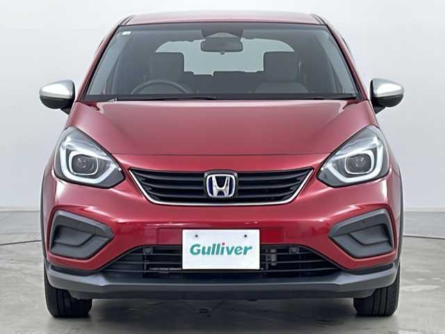 ホンダ フィット e:HEVクロスター 道央・札幌 2020(令2)年 1.4万km プレミアムクリスタルレッドM ・4WD/・純正Gathersナビ&フルセグ&CD&DVD&SD&BT&AUX&USB&ipod/・ホンダセンシング/・路外逸脱抑制機能/・踏み間違え衝突軽減システム/・衝突軽減ブレーキ/・誤発進抑制システム/・後方誤発進抑制システム/・先行車事故低減ステアリング/・先行車発進お知らせ/・渋滞追従機能型アダプティブクルーズコントロール/・車線維持システム/・標識認識システム/・オートマチックハイビーム/・クリアランスソナー/・バックカメラ/・電動ブレーキホールド/・フロントワイパーデアイサー/・革巻きステアリング/・ステアリングスイッチ/・オートライト/・ヘッドライトレベライザー/・LEDヘッドライト/・スマートキー/・プッシュスタート/・アイドリングストップ/・横滑り防止/・ECON