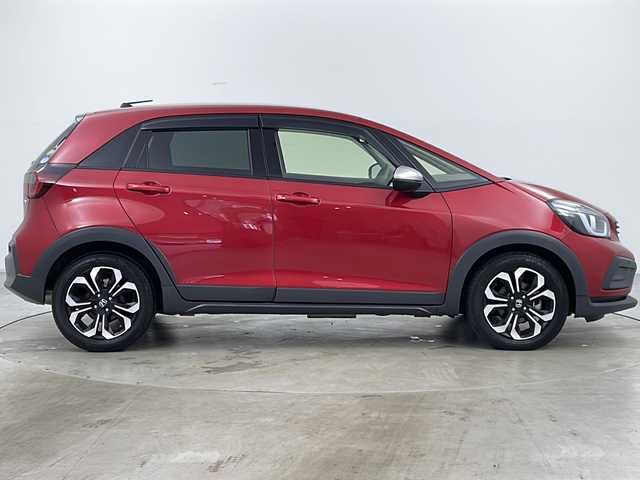 ホンダ フィット e:HEVクロスター 道央・札幌 2020(令2)年 1.4万km プレミアムクリスタルレッドM ・4WD/・純正Gathersナビ&フルセグ&CD&DVD&SD&BT&AUX&USB&ipod/・ホンダセンシング/・路外逸脱抑制機能/・踏み間違え衝突軽減システム/・衝突軽減ブレーキ/・誤発進抑制システム/・後方誤発進抑制システム/・先行車事故低減ステアリング/・先行車発進お知らせ/・渋滞追従機能型アダプティブクルーズコントロール/・車線維持システム/・標識認識システム/・オートマチックハイビーム/・クリアランスソナー/・バックカメラ/・電動ブレーキホールド/・フロントワイパーデアイサー/・革巻きステアリング/・ステアリングスイッチ/・オートライト/・ヘッドライトレベライザー/・LEDヘッドライト/・スマートキー/・プッシュスタート/・アイドリングストップ/・横滑り防止/・ECON