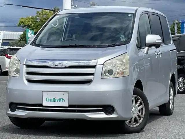 トヨタ ノア X スマートエディション 道央・札幌 2009(平21)年 13.6万km シルバーM ４WD/寒冷地仕様/純正ディーラーOPナビ/CD/DVD/SD/ワンセグ/センターデフロック/バックカメラ/ETC/ECOMODE/ステアリングリモコン/両側パワースライドドア/プッシュスタート/スマートキー/HIDヘッドライト/オートライト/電動格納ミラー/ウィンカーミラー/純正フロアマット/スペアキー/社外エンジンスターター