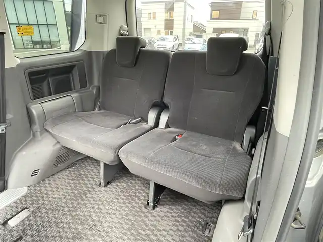 トヨタ ノア X スマートエディション 道央・札幌 2009(平21)年 13.6万km シルバーM ４WD/寒冷地仕様/純正ディーラーOPナビ/CD/DVD/SD/ワンセグ/センターデフロック/バックカメラ/ETC/ECOMODE/ステアリングリモコン/両側パワースライドドア/プッシュスタート/スマートキー/HIDヘッドライト/オートライト/電動格納ミラー/ウィンカーミラー/純正フロアマット/スペアキー/社外エンジンスターター