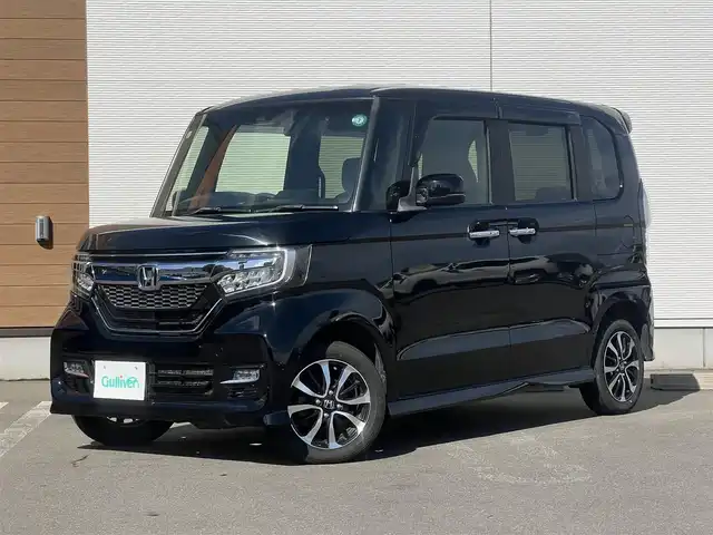 ホンダ Ｎ ＢＯＸ カスタム G EX ホンダセンシング 秋田県 2017(平29)年 7.9万km クリスタルブラックパール ４WD/安全運転支援システムホンダセンシング/衝突軽減ブレーキ/片側パワースライドドア/LEDヘッドライト/純正メモリナビ（DVD/CD再生可能）/フルセグ/バックカメラ/ホンダ純正14インチアルミ（夏タイヤ装着）/スマートキー/アイドリングストップ/プッシュスタート/アダプティブ・クルーズコントロール追従走行有/コーナーセンサー/オートマチックハイビーム/レーンキープアシスト/ステアリングスイッチ/前席シートヒーター/ビルトインETC/純正フロアマット/社外ドアバイザー/オートライト/オートエアコン/パワーステアリング/パワーウィンドウ/横滑り防止/盗難防止装置/寒冷地仕様/電動格納ウィンカーミラー/キーレスエントリー/保証書/取扱説明書/記録簿/スペアキー２本以上有