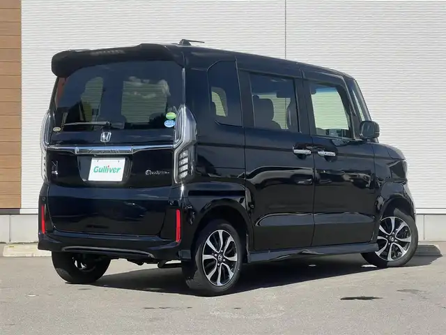 ホンダ Ｎ ＢＯＸ カスタム G EX ホンダセンシング 秋田県 2017(平29)年 7.9万km クリスタルブラックパール ４WD/安全運転支援システムホンダセンシング/衝突軽減ブレーキ/片側パワースライドドア/LEDヘッドライト/純正メモリナビ（DVD/CD再生可能）/フルセグ/バックカメラ/ホンダ純正14インチアルミ（夏タイヤ装着）/スマートキー/アイドリングストップ/プッシュスタート/アダプティブ・クルーズコントロール追従走行有/コーナーセンサー/オートマチックハイビーム/レーンキープアシスト/ステアリングスイッチ/前席シートヒーター/ビルトインETC/純正フロアマット/社外ドアバイザー/オートライト/オートエアコン/パワーステアリング/パワーウィンドウ/横滑り防止/盗難防止装置/寒冷地仕様/電動格納ウィンカーミラー/キーレスエントリー/保証書/取扱説明書/記録簿/スペアキー２本以上有