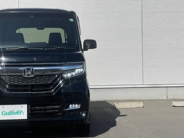 ホンダ Ｎ ＢＯＸ カスタム G EX ホンダセンシング 秋田県 2017(平29)年 7.9万km クリスタルブラックパール ４WD/安全運転支援システムホンダセンシング/衝突軽減ブレーキ/片側パワースライドドア/LEDヘッドライト/純正メモリナビ（DVD/CD再生可能）/フルセグ/バックカメラ/ホンダ純正14インチアルミ（夏タイヤ装着）/スマートキー/アイドリングストップ/プッシュスタート/アダプティブ・クルーズコントロール追従走行有/コーナーセンサー/オートマチックハイビーム/レーンキープアシスト/ステアリングスイッチ/前席シートヒーター/ビルトインETC/純正フロアマット/社外ドアバイザー/オートライト/オートエアコン/パワーステアリング/パワーウィンドウ/横滑り防止/盗難防止装置/寒冷地仕様/電動格納ウィンカーミラー/キーレスエントリー/保証書/取扱説明書/記録簿/スペアキー２本以上有