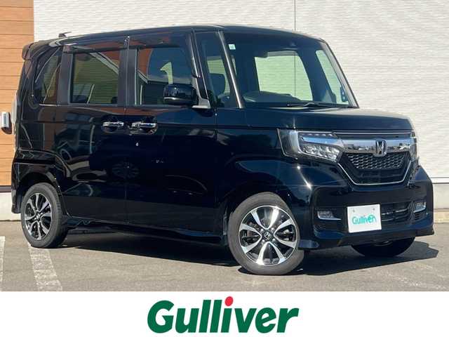 ホンダ Ｎ ＢＯＸ カスタム G EX ホンダセンシング 秋田県 2017(平29)年 7.9万km クリスタルブラックパール ４WD/安全運転支援システムホンダセンシング/衝突軽減ブレーキ/片側パワースライドドア/LEDヘッドライト/純正メモリナビ（DVD/CD再生可能）/フルセグ/バックカメラ/ホンダ純正14インチアルミ（夏タイヤ装着）/スマートキー/アイドリングストップ/プッシュスタート/アダプティブ・クルーズコントロール追従走行有/コーナーセンサー/オートマチックハイビーム/レーンキープアシスト/ステアリングスイッチ/前席シートヒーター/ビルトインETC/純正フロアマット/社外ドアバイザー/オートライト/オートエアコン/パワーステアリング/パワーウィンドウ/横滑り防止/盗難防止装置/寒冷地仕様/電動格納ウィンカーミラー/キーレスエントリー/保証書/取扱説明書/記録簿/スペアキー２本以上有