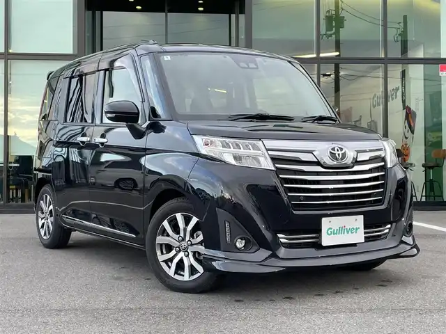 トヨタ ルーミー カスタムG－T 愛媛県 2020(令2)年 3.8万km ブラックマイカメタリック 純正9型ナビ(フルセグTV/BT)/両側パワースライドドア/バックカメラ/スマートアシスト/クルーズコントロール/クリアランスソナー/衝突被害軽減装置/車線逸脱防止装置/LEＤヘッドライト/オートライト/ドライブレコーダー/ETC2.0/後席サンシェイド/電格ミラー/ステアリングリモコン/シガーソケット/純正ドアバイザー/現状サマー(純正AW)(175/65/R15)/GOODYEAR EfficientGrip ECO EG02/禁煙車