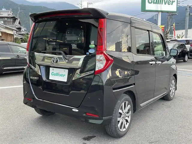 トヨタ ルーミー カスタムG－T 愛媛県 2020(令2)年 3.8万km ブラックマイカメタリック 純正9型ナビ(フルセグTV/BT)/両側パワースライドドア/バックカメラ/スマートアシスト/クルーズコントロール/クリアランスソナー/衝突被害軽減装置/車線逸脱防止装置/LEＤヘッドライト/オートライト/ドライブレコーダー/ETC2.0/後席サンシェイド/電格ミラー/ステアリングリモコン/シガーソケット/純正ドアバイザー/現状サマー(純正AW)(175/65/R15)/GOODYEAR EfficientGrip ECO EG02/禁煙車