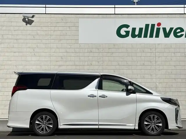 トヨタ アルファード S タイプゴールドⅡ 岩手県 2021(令3)年 7.4万km ホワイトパールクリスタルシャイン 禁煙車/4WD/モデリスタフルエアロ/モデリスタマフラー/純正ディスプレイオーディオ（ナビ機能付）/→Bluetooth/DVD/FM/AM/純正後席用フリップダウンモニター/バックカメラ/両側パワースライドドア/パワーバックドア/ハーフレザー/トヨタセーフティセンス/追従型クルーズコントロール/レーンキープアシスト/衝突軽減システム/横滑り防止装置/電子パーキング/オートブレーキホールド/オートライト/オートハイビーム/LEDヘッドライト/LEDフォグライト/純正エンジンスターター/ステアリングスイッチ/プッシュスタート/社外フロアマット/シガーソケット/スマートキー/ビルトインETC/オットマン