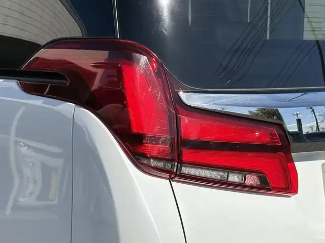 トヨタ アルファード S タイプゴールドⅡ 岩手県 2021(令3)年 7.4万km ホワイトパールクリスタルシャイン 禁煙車/4WD/モデリスタフルエアロ/モデリスタマフラー/純正ディスプレイオーディオ（ナビ機能付）/→Bluetooth/DVD/FM/AM/純正後席用フリップダウンモニター/バックカメラ/両側パワースライドドア/パワーバックドア/ハーフレザー/トヨタセーフティセンス/追従型クルーズコントロール/レーンキープアシスト/衝突軽減システム/横滑り防止装置/電子パーキング/オートブレーキホールド/オートライト/オートハイビーム/LEDヘッドライト/LEDフォグライト/純正エンジンスターター/ステアリングスイッチ/プッシュスタート/社外フロアマット/シガーソケット/スマートキー/ビルトインETC/オットマン