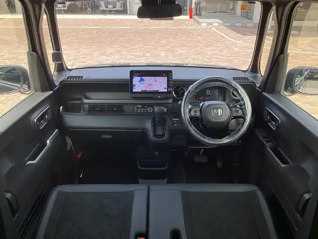 ホンダ Ｎ ＢＯＸ カスタム ターボ 三重県 2023(令5)年 0.5万km トワイライトミストブラックパール Honda SENSING/衝突軽減ブレーキ（CMBS）/踏み間違い衝突軽減システム/路外逸脱抑制機能/歩行者事故低減ステアリング/先行車発進お知らせ機能/標識認識機能/オートハイビーム/パーキングセンサーシステム/アダプティブクルーズコントロール/純正9インチナビ/フルセグ/Bluetooth/Apple Car Play/Android Auto/360°カメラ/LEDヘッドライト/両側パワースライドドア/前席シートヒーター/スマートキー/プッシュスタート/ハーフレザーシート/シートバックテーブル/ステアリングスイッチ/純正15インチアルミ