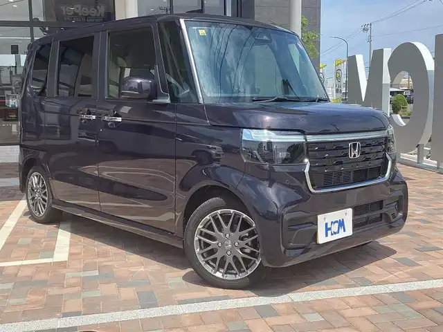 ホンダ Ｎ ＢＯＸ カスタム ターボ 三重県 2023(令5)年 0.5万km トワイライトミストブラックパール Honda SENSING/衝突軽減ブレーキ（CMBS）/踏み間違い衝突軽減システム/路外逸脱抑制機能/歩行者事故低減ステアリング/先行車発進お知らせ機能/標識認識機能/オートハイビーム/パーキングセンサーシステム/アダプティブクルーズコントロール/純正9インチナビ/フルセグ/Bluetooth/Apple Car Play/Android Auto/360°カメラ/LEDヘッドライト/両側パワースライドドア/前席シートヒーター/スマートキー/プッシュスタート/ハーフレザーシート/シートバックテーブル/ステアリングスイッチ/純正15インチアルミ