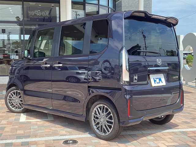 ホンダ Ｎ ＢＯＸ カスタム ターボ 三重県 2023(令5)年 0.5万km トワイライトミストブラックパール Honda SENSING/衝突軽減ブレーキ（CMBS）/踏み間違い衝突軽減システム/路外逸脱抑制機能/歩行者事故低減ステアリング/先行車発進お知らせ機能/標識認識機能/オートハイビーム/パーキングセンサーシステム/アダプティブクルーズコントロール/純正9インチナビ/フルセグ/Bluetooth/Apple Car Play/Android Auto/360°カメラ/LEDヘッドライト/両側パワースライドドア/前席シートヒーター/スマートキー/プッシュスタート/ハーフレザーシート/シートバックテーブル/ステアリングスイッチ/純正15インチアルミ