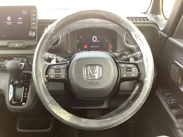 ホンダ Ｎ ＢＯＸ カスタム ターボ 三重県 2023(令5)年 0.5万km トワイライトミストブラックパール Honda SENSING/衝突軽減ブレーキ（CMBS）/踏み間違い衝突軽減システム/路外逸脱抑制機能/歩行者事故低減ステアリング/先行車発進お知らせ機能/標識認識機能/オートハイビーム/パーキングセンサーシステム/アダプティブクルーズコントロール/純正9インチナビ/フルセグ/Bluetooth/Apple Car Play/Android Auto/360°カメラ/LEDヘッドライト/両側パワースライドドア/前席シートヒーター/スマートキー/プッシュスタート/ハーフレザーシート/シートバックテーブル/ステアリングスイッチ/純正15インチアルミ
