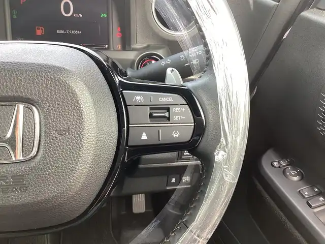 ホンダ Ｎ ＢＯＸ カスタム ターボ 三重県 2023(令5)年 0.5万km トワイライトミストブラックパール Honda SENSING/衝突軽減ブレーキ（CMBS）/踏み間違い衝突軽減システム/路外逸脱抑制機能/歩行者事故低減ステアリング/先行車発進お知らせ機能/標識認識機能/オートハイビーム/パーキングセンサーシステム/アダプティブクルーズコントロール/純正9インチナビ/フルセグ/Bluetooth/Apple Car Play/Android Auto/360°カメラ/LEDヘッドライト/両側パワースライドドア/前席シートヒーター/スマートキー/プッシュスタート/ハーフレザーシート/シートバックテーブル/ステアリングスイッチ/純正15インチアルミ