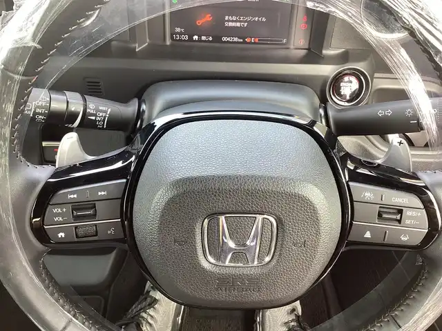 ホンダ Ｎ ＢＯＸ カスタム ターボ 三重県 2023(令5)年 0.5万km トワイライトミストブラックパール Honda SENSING/衝突軽減ブレーキ（CMBS）/踏み間違い衝突軽減システム/路外逸脱抑制機能/歩行者事故低減ステアリング/先行車発進お知らせ機能/標識認識機能/オートハイビーム/パーキングセンサーシステム/アダプティブクルーズコントロール/純正9インチナビ/フルセグ/Bluetooth/Apple Car Play/Android Auto/360°カメラ/LEDヘッドライト/両側パワースライドドア/前席シートヒーター/スマートキー/プッシュスタート/ハーフレザーシート/シートバックテーブル/ステアリングスイッチ/純正15インチアルミ