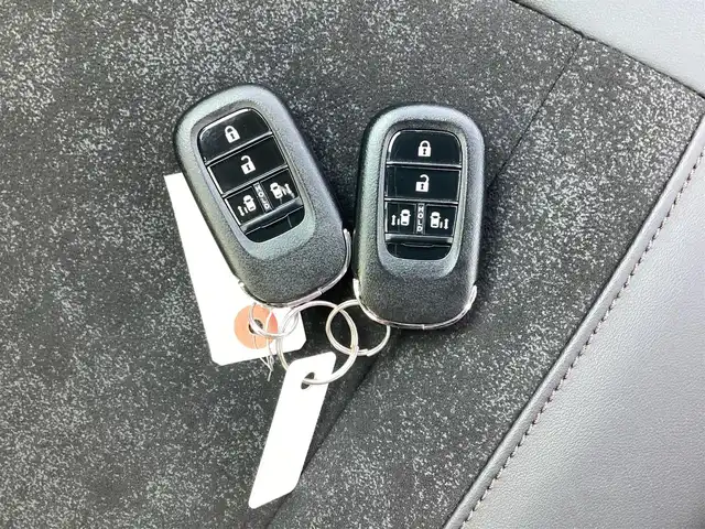 ホンダ Ｎ ＢＯＸ カスタム ターボ 三重県 2023(令5)年 0.5万km トワイライトミストブラックパール Honda SENSING/衝突軽減ブレーキ（CMBS）/踏み間違い衝突軽減システム/路外逸脱抑制機能/歩行者事故低減ステアリング/先行車発進お知らせ機能/標識認識機能/オートハイビーム/パーキングセンサーシステム/アダプティブクルーズコントロール/純正9インチナビ/フルセグ/Bluetooth/Apple Car Play/Android Auto/360°カメラ/LEDヘッドライト/両側パワースライドドア/前席シートヒーター/スマートキー/プッシュスタート/ハーフレザーシート/シートバックテーブル/ステアリングスイッチ/純正15インチアルミ