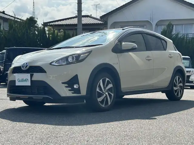 トヨタ アクア クロスオーバー 山形県 2018(平30)年 4.8万km ベージュ 純正ナビ　/ドライブレコーダー　/ビルトインＥＴＣ　/バックカメラ　/衝突軽減システム　/盗難防止装置　/横滑り防止装置　/レーンキープアシスト　/アイドリングストップ/ハーフレザー　/シートヒーター　/ＬＥＤヘッドライト　/オートハイビーム/オートライト/プッシュスタート/スマートキー/ルーフレール/純正16インチアルミホイール