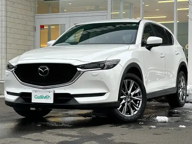 マツダ ＣＸ－５ XD エクスクルーシブモード 道央・札幌 2019(平31)年 6.1万km スノーフレイクホワイトパールマイカ ・４WD/・純正SDナビ/フルセグTV＆Bluetooth＆CD＆DVD/・衝突軽減ブレーキ/・ETC/・レーンキープアシスト/・クルーズコントロール/・パーキングソナー/・コーナーセンサー/・アイドリングストップ/・バックカメラ/・360度カメラ/・パワーバックドア/・BOSEサウンド/・レザーシート/・メモリーシート/・シートヒーター/・ベンチレーションシート/・パワーシート/・MT付AT/・パドルシフト/・ステアリングヒーター/・プッシュスタート/・スマートキー/・純正エンジンスターター/・オートライト/・LEDヘッドライト/・レインセンサーワイパー/・室内LED灯/・オートリトラミラー/・ウインカーミラー