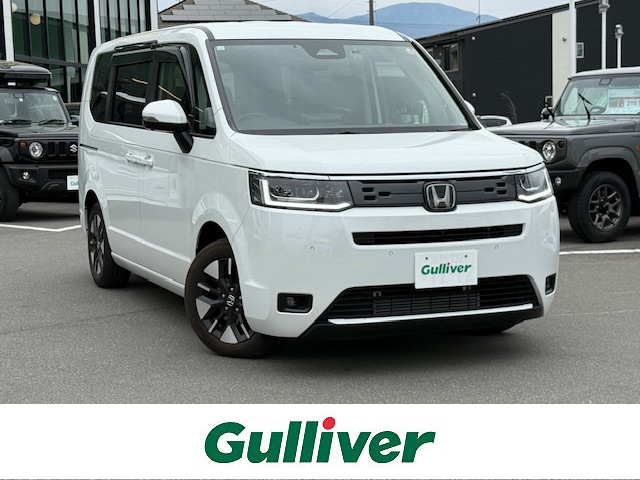 ホンダ ステップワゴン エアー 長野県 2023(令5)年 2.2万km プラチナホワイトパール 純正１１．４インチナビ/ステアリングスイッチ/プッシュスタート　/Bluetooth接続/DVD再生可能/フルセグTV/全方位カメラ/純正16インチアルミホイール/社外AW付きスタッドレス車載/シーケンシャルウインカー　/両側パワースライドドア　/クルーズコントロール　/ＬＥＤヘッドライト　/オートライト/ミラーヒーター/レーン逸脱警報/ＥＴＣ　