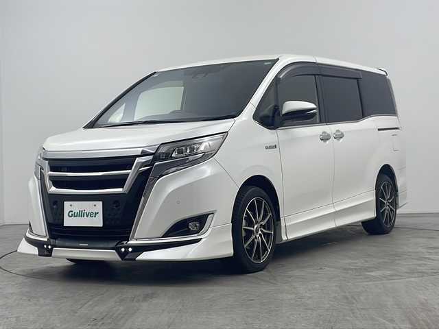 トヨタ エスクァイア ハイブリッド Gi プレミアムパッケージ 大阪府 2019(平31)年 4.9万km ホワイトパールクリスタルシャイン 禁煙車/１０インチサイバーナビ/バックカメラ/１１．６インチ社外後席モニター/ＴＲＤフルエアロ　/トヨタセーフティセンス　/両側パワースライドドア　/前後クリアランスソナー　/ＤＮ席シートヒーター　/ハーフレザーシート/WAC/ウッドコンビステアリング/オートハイビーム /ETC/LED/フォグ