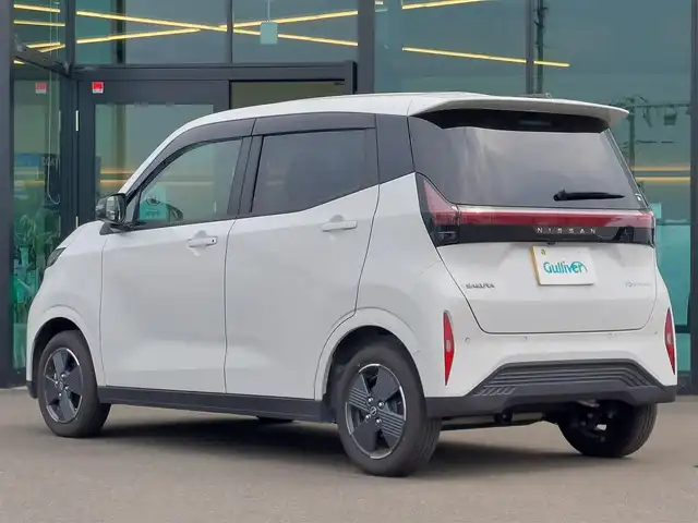 日産 サクラ X 東京都 2024(令6)年 0.5万km ホワイトパール 純正ナビ/アラウンドビューモニター/フルセグ/ドライブレコーダー/ビルトインETC/e-Pedal/エマージェンシーブレーキ/車線逸脱防止支援システム/前方衝突予測警報/LEDヘッドライト/オートライト/スマートキー