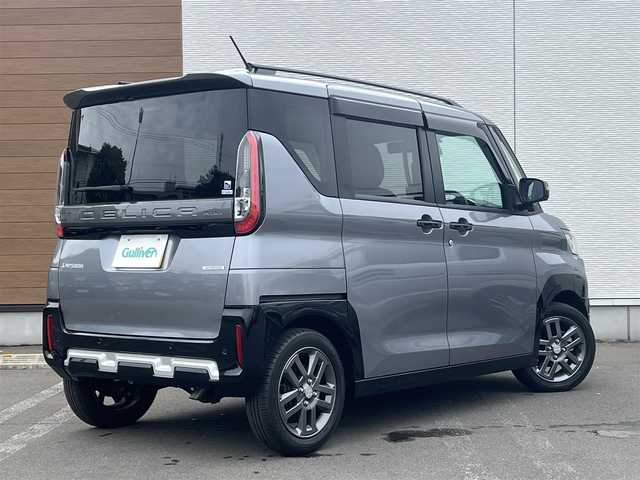三菱 デリカミニ T プレミアム 秋田県 2024(令6)年 1.6万km グレーⅡ ４WD/ターボ/LEDヘッドライト/両側パワスラ/社外ナビ/フルセグ/全方位カメラ/社外アルミ/スマートキー/プッシュスタート/オートマチックハイビーム/クルーズコントロール/ダウンヒルアシストコントロール/コーナーセンサー/ステアリングスイッチ/ステアリングヒーター/アラウンドビューモニター/ETC/ルーフレール/社外フロアマット/純正ドアバイザー/オートライト/オートエアコン/パワーステアリング/パワーウィンドウ/横滑り防止/レベライザー/電動格納ウィンカーミラー/保証書/取扱説明書/記録簿