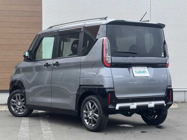 三菱 デリカミニ T プレミアム 秋田県 2024(令6)年 1.6万km グレーⅡ ４WD/ターボ/LEDヘッドライト/両側パワスラ/社外ナビ/フルセグ/全方位カメラ/社外アルミ/スマートキー/プッシュスタート/オートマチックハイビーム/クルーズコントロール/ダウンヒルアシストコントロール/コーナーセンサー/ステアリングスイッチ/ステアリングヒーター/アラウンドビューモニター/ETC/ルーフレール/社外フロアマット/純正ドアバイザー/オートライト/オートエアコン/パワーステアリング/パワーウィンドウ/横滑り防止/レベライザー/電動格納ウィンカーミラー/保証書/取扱説明書/記録簿