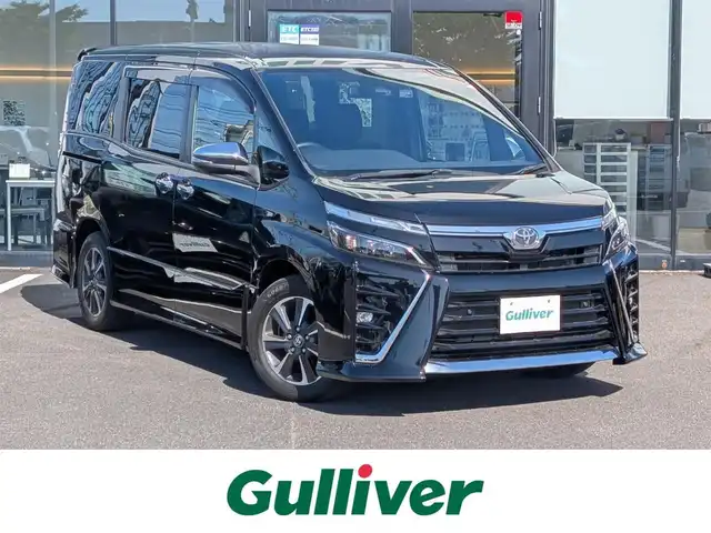 トヨタ ヴォクシー ZS 煌Ⅱ 福井県 2020(令2)年 3.2万km ブラック 純正16インチAW/両側パワースライドドア/LEDヘッドライト/クルーズコントロール/前後コーナーセンサー/前後ドライブレコーダー/ビルトインETC/衝突被害軽減システム/バックカメラ/純正SDナビ/フルセグテレビ/レーンキープアシスト/横滑り防止装置/盗難防止装置/オートマチックハイビーム/アイドリングストップ/スマートキー/ダブルエアバッグ