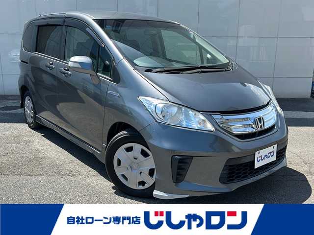 ホンダ フリード ハイブリット ジャストセレクション 埼玉県 2012(平24)年 2.6万km ポリッシュドメタルメタリック (株)IDOMが運営する【じしゃロン熊谷店】の自社ローン専用車両になりますこちらは現金またはオートローンご利用時の価格です。自社ローンご希望の方は別途その旨お申付け下さい/純正カーオーディオ（WX-128CU)/・AM/FM/CD/AUX/USB/片側パワースライドドア/3列シート/クルーズコントロール/チップアップシート/純正フロアマット/オートライト/純正HIDヘッドライト/ABS/横滑り防止機能/盗難防止装置/取扱説明書/ECON/ドアバイザー/シガーソケット