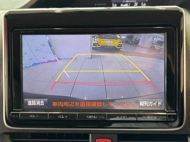 トヨタ エスクァイア ハイブリッド Gi 埼玉県 2015(平27)年 12.5万km スパークリングブラックパールクリスタルシャイン フリップダウンモニター/純正9インチSDナビ/　　CD/BT/フルセグ/バックカメラ/両側パワースライドドア/クルーズコントロール/LEDオートライト/レザーシート/シートヒーター/純正15インチアルミホイール/ステアリングスイッチ/アイドリングストップ/スマートキー2本/ビルトインETC