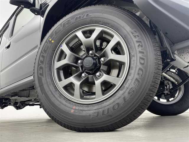 スズキ ジムニー ノマド FC 群馬県 2025(令7)年 0.1万km未満 黒 登録済未使用車(登録時走行距離：50km)/―――――――――――/7インチナビ/・Bluetooth/ワンセグTV/CD/DVD/HDD/AM/FM/アダプティブクルーズコントロール/デュアルカメラブレーキサポート/車線逸脱警報/ふらつき警報/後退時ブレーキサポート/ハイビームアシスト/標識認識機能/誤発進/後方誤発進抑制機能/先行車発進お知らせ機能/ヒルディセントコントロール/LEDヘッドランプ/ヘッドランプウォッシャー/前席シートヒーター/純正15インチアルミホイール
