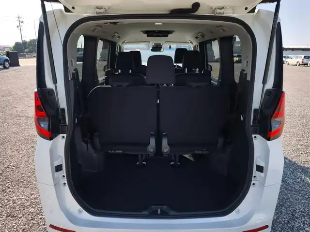 スズキ ランディ ハイブリッドG 富山県 2022(令4)年 5.6万km ホワイトパールクリスタルシャイン 〇純正ナビ/〇フルセグTV/〇バックカメラ/〇11.6インチフリップダウンモニター/〇両側パワースライドドア/〇ビルトインETC/〇前後ドラレコ/〇コーナーセンサー/〇セーフティセンス/〇革巻きステアリング/〇シートヒーター/〇左右独立温度調整オートエアコン/〇純正16インチアルミ/〇スマートキー/〇禁煙車