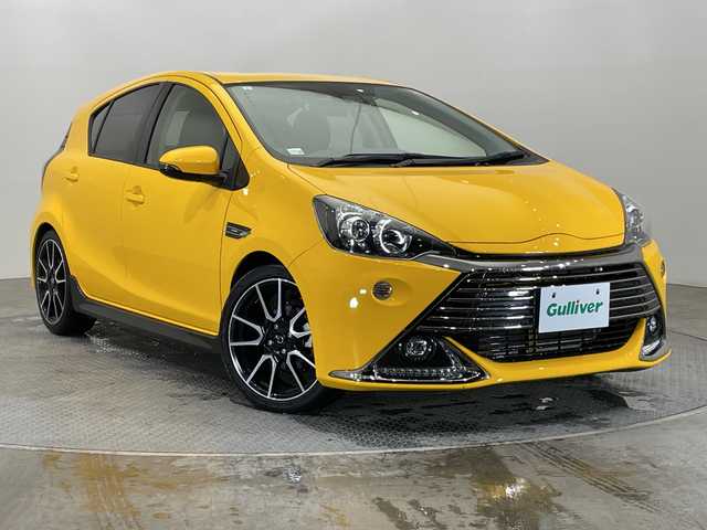 トヨタ アクア G G’s 栃木県 2017(平29)年 3.1万km イエロー 純正SDナビ/(CD/ワンセグTV/Bluetooth/SD/AUX)/バックカメラ/ビルトインETC/前方ドライブレコーダー/ハーフレザーシート/シーケンシャルウィンカー/オートライト/LEDヘッドライト/横滑り防止装置/フォグランプ/スマートキー/プッシュスタート/ステアリングスイッチ/革巻きステアリング/ウィンカーミラー/１７インチ純正アルミホイール/純正フロアマット/社外スプリング