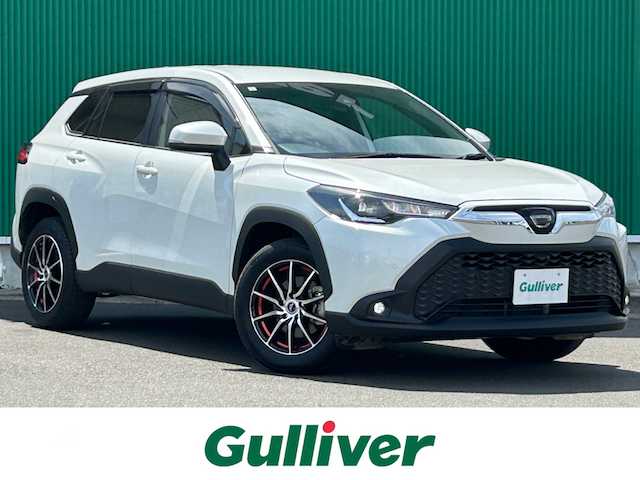 トヨタ カローラ クロス G 宮城県 2024(令6)年 0.8万km プラチナホワイトパールマイカ セーフティセンス/・プリクラッシュセーフティ/・レーントレーシングアシスト/・レーダークルーズコントロール/・オートマチックハイビーム/・ロードサインアシスト/パーキングサポートブレーキ（前後方静止物）/ディスプレイオーディオ/・ナビ機能付/・Bluetooth/・AppleCarPlay/AndroidAuto/バックカメラ/ETC/革巻きステアリング/ステアリングスイッチ/MTモード付AT/電動パーキングブレーキ/ブレーキホールド/LEDヘッドランプ/オートライト/スマートキー/プッシュスタート/スペアキー1本/電動格納ミラー/社外17インチAW/フロアマット/ドアバイザー/W/サイド/カーテンエアバッグ