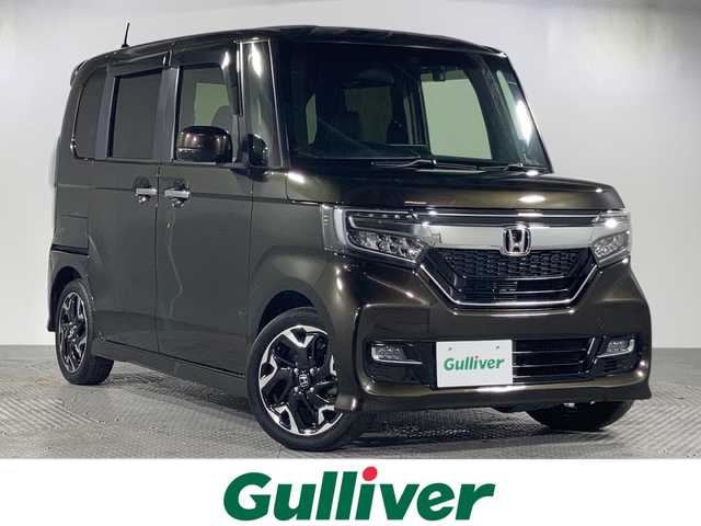 ホンダ Ｎ ＢＯＸ カスタム G L ターボ ホンダセンシング 沖縄県 2018(平30)年 6.8万km プレミアムグラマラスブロンズP 県外仕入れ/両側パワースライドドア/ホンダセンシング/・衝突軽減ブレーキ（CMBS）/・誤発進抑制機能/・路外逸脱抑制機能/・アダプティブクルーズコントロール（ACC）/・車線維持支援システム（LKAS）/社外ナビ/（フルセグTV/CD/DVD/BT）/バックカメラ/パドルシフト/ハーフレザーシート/ビルドインETC/コーナーセンサー/前方ドライブレコーダー/オートライト/スマートキー