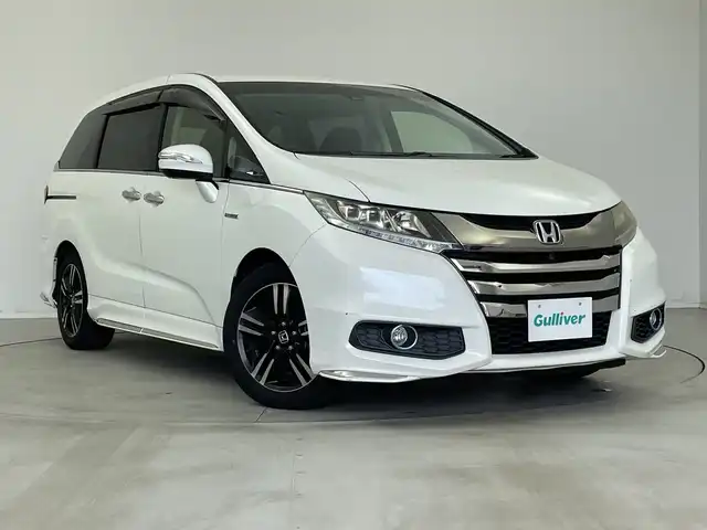 ホンダ オデッセイ ハイブリッド アブソルートセンシングアドバンP 新潟県 2016(平28)年 6.6万km ホワイトオーキッドパール メーカー純正インターナビ/(CD.DVD.フルセグ.Bluetooth)/全方位カメラ/革巻きステアリング/ステアリングリモコン/LEDオートライト/フォグランプ/ホンダセンシング/レーダークルーズコントロール/レーンキープアシスト/ハーフレザーシート/運転席パワーシート/EVモード/電動格納ウィンカーミラー/ECON/プッシュスタート/スマートキー×2/純正フロアマット